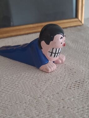Vintage Grinning Character Doorstop